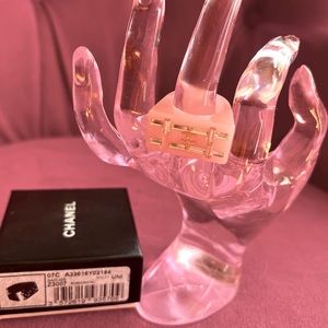Authentic CHANEL baby pink resin ring with crystal baguettes. Size 7